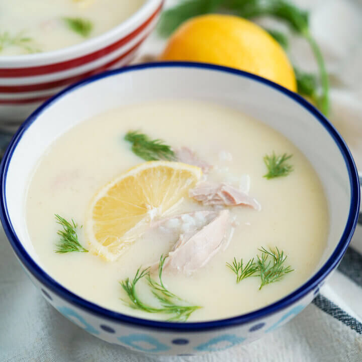 side close up view of bowl of avgolemono soup.