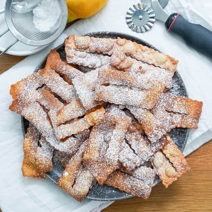 plate of chiacchiere fried pastries from overhead.